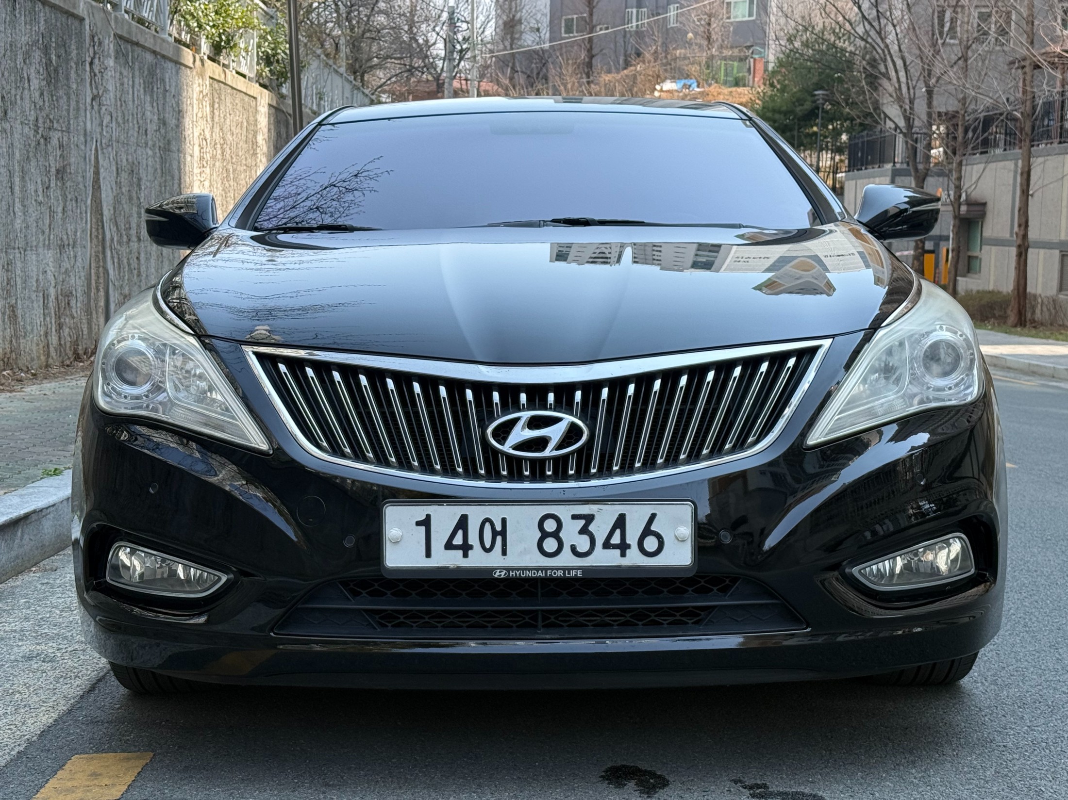 Used Korean vehicle on a dealer lot in South Korea